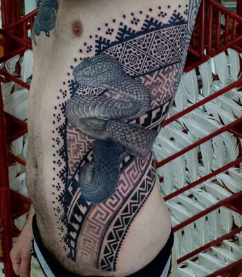 Izhar Rott Tattoo, snake tattoo, sacred geometry, rib tattoo