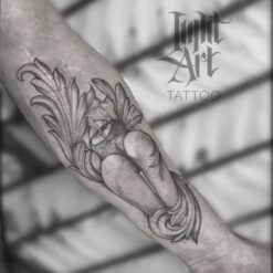 arm tattoo, sleeve tattoo, light art tattoo, women tattooer